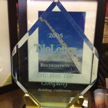 Eric Ross Tile - a glass award on a table - General Contractors Near Me - Redding, California