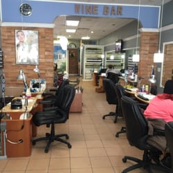 Hot Nails Salon & Spa - View showing more of the manicure area. The chairs were very comfy and you can watch tv while having your nails done.
