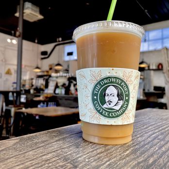 Drowsy Poet at The Foley Station - The drowsy poet iced vanilla latte - Coffee & Tea Near Me - Foley, Alabama Drowsy Poet at The Foley Station - The drowsy poet iced vanilla latte - Coffee & Tea Near Me - Foley, Alabama
