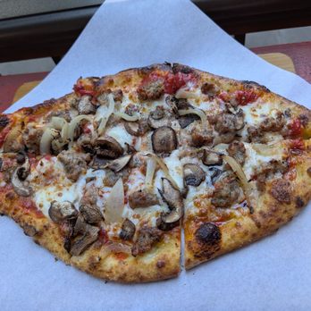 SWeL Restaurant - Italian sausage pizza $14.50. A nice sharable potion. - New American Near Me - Seattle, Washington SWeL Restaurant - Italian sausage pizza $14.50. A nice sharable potion. - New American Near Me - Seattle, Washington