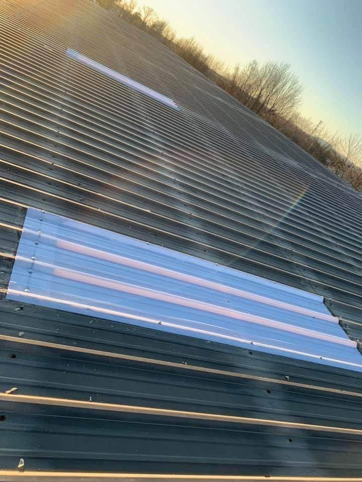 Slide of Tycon Roofing