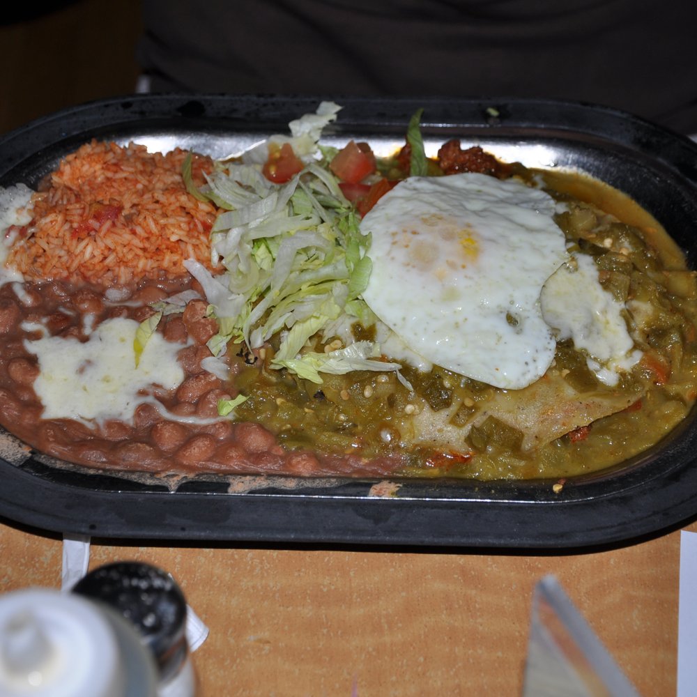 Tomasita's - enchilada with an egg on top - New Mexican Cuisine Near Me - Santa Fe, New Mexico Tomasita's - enchilada with an egg on top - New Mexican Cuisine Near Me - Santa Fe, New Mexico