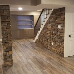 Cultured stone column and along stair wall