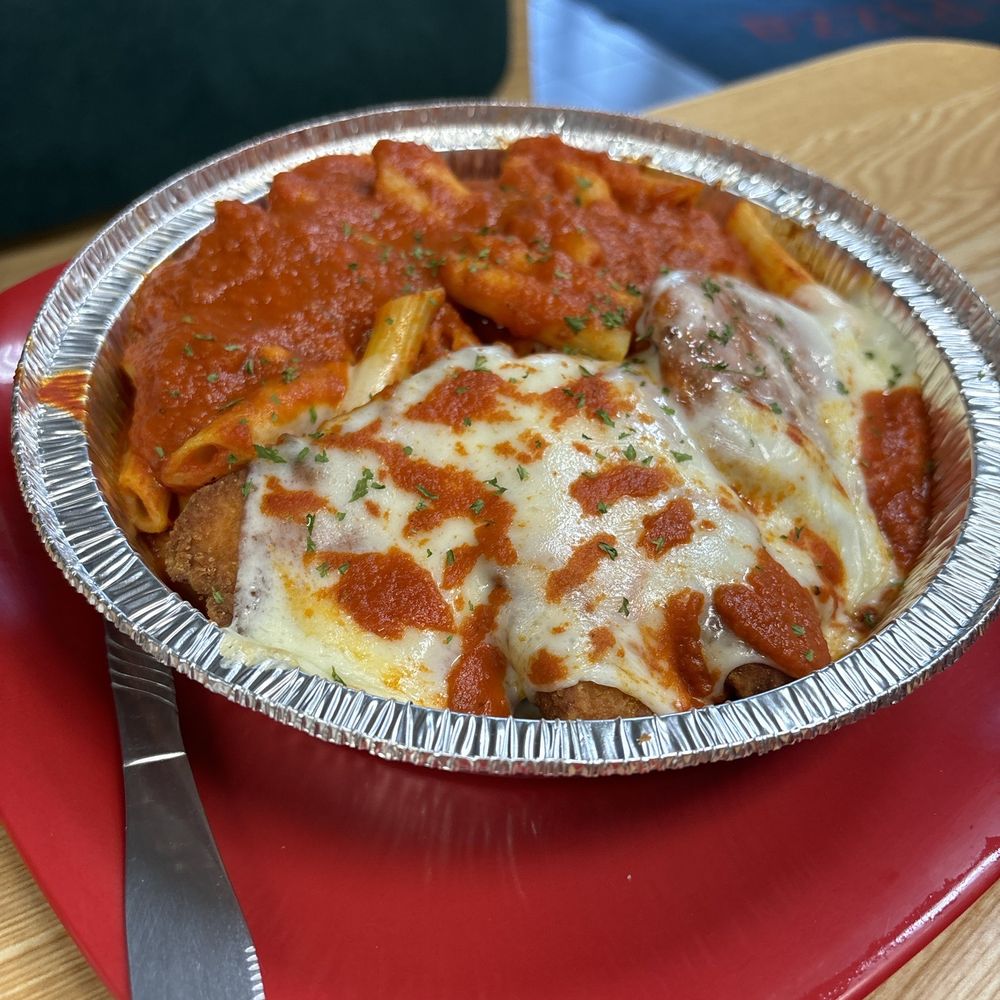 Chicken Parmigiana over Pasta Chicken Parmigiana over Pasta