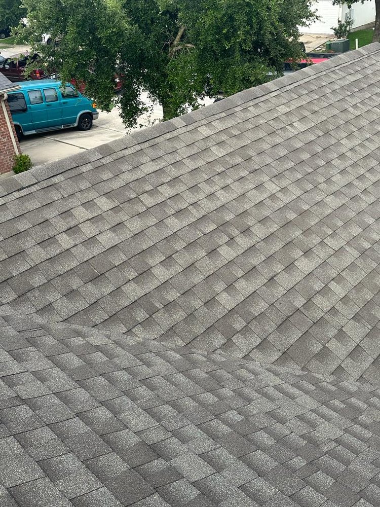 Slide of EZS Roofing & Construction