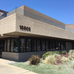 Ronald J Oleson, DDS - Office entrance is inside the building. Park in rear & enter through double doors. Suite #140
