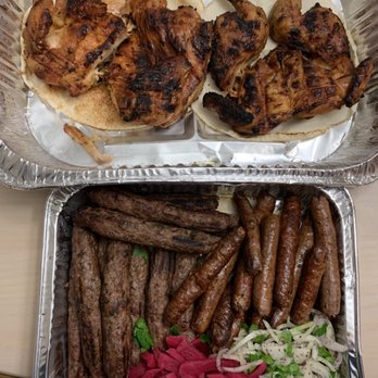 Marché Sahara - two trays of food on a table - Meat Shops Near Me - La Prairie, Quebec Marché Sahara - two trays of food on a table - Meat Shops Near Me - La Prairie, Quebec