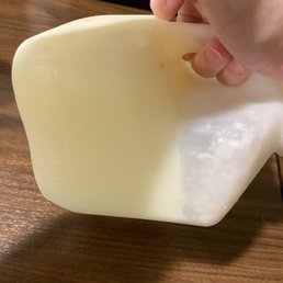 Milk after it froze in the "fridge"