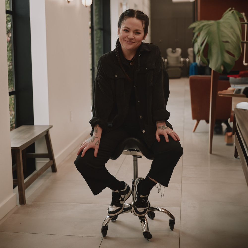 Traci Barrett hair  Logo