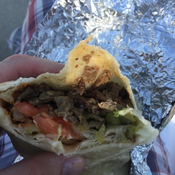 El Burrito Mexicano - After a bite of the carne asada burrito - Mexican Near Me - Chicago, Illinois