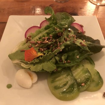 Mana Restaurant - Butter lettuce salad. Quail egg. Sweet tomatoes. Hemp dressing. Candied sunflower seeds. - New American Near Me - Leavenworth, Washington Mana Restaurant - Butter lettuce salad. Quail egg. Sweet tomatoes. Hemp dressing. Candied sunflower seeds. - New American Near Me - Leavenworth, Washington
