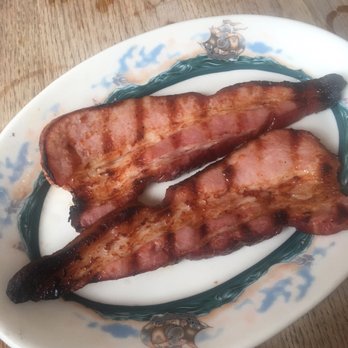 Peter Luger - Luger's Sizzling Bacon, Extra Thick by the Slice - Steakhouses Near Me - Brooklyn, New York Peter Luger - Luger's Sizzling Bacon, Extra Thick by the Slice - Steakhouses Near Me - Brooklyn, New York