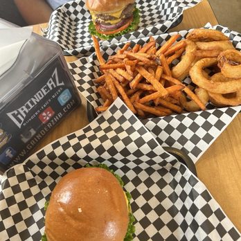 Grinderz - Cheeseburger, double cheeseburger and a 50/50 of sweet potato fries and onion rings - Burgers Near Me - Huntington Beach, California Grinderz - Cheeseburger, double cheeseburger and a 50/50 of sweet potato fries and onion rings - Burgers Near Me - Huntington Beach, California