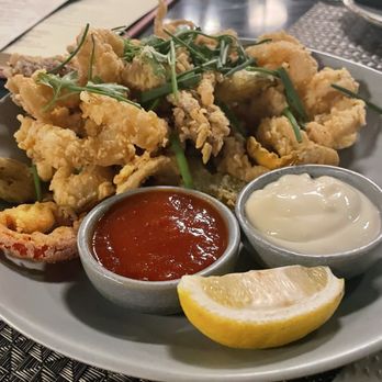 Timpano Las Olas - Semolina-Dusted Calamari - Italian Near Me - Fort Lauderdale, Florida Timpano Las Olas - Semolina-Dusted Calamari - Italian Near Me - Fort Lauderdale, Florida