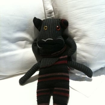 Boo Radley's - Biff, a Stacie Ellis sock creature resting at the hotel - Toy Stores Near Me - Spokane, Washington