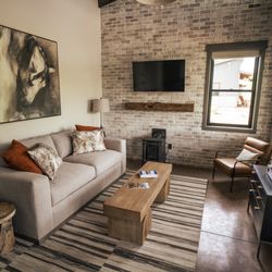 The Meadows on Rock Creek - Living room of two bedroom cabins