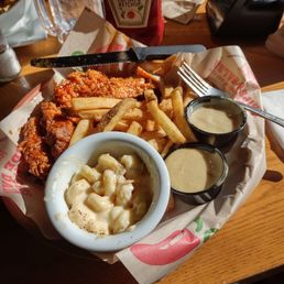 Chicken crispers, fries, Mac and cheese, honey mustard sauce. Chicken crispers, fries, Mac and cheese, honey mustard sauce.