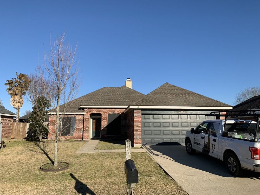 Slide of Pelican Roofing Company