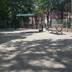 Stevens Park Dog Run - Dog park with gravel and drinking water. Nice size with plenty of seating, clean, & has poop bags available.