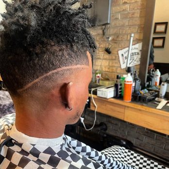 Hair Design International - Mid fade with straight razor line - Hair Salons Near Me - Chicago, Illinois Hair Design International - Mid fade with straight razor line - Hair Salons Near Me - Chicago, Illinois