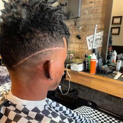 Hair Design International - Mid fade with straight razor line