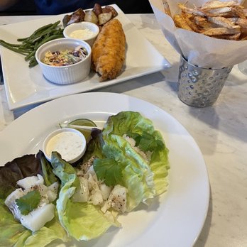 The Table - Closest are fish tacos without the tortillas and salsa. Furthest is the fried flounder dinner. - Restaurants Near Me - Deltaville, Virginia The Table - Closest are fish tacos without the tortillas and salsa. Furthest is the fried flounder dinner. - Restaurants Near Me - Deltaville, Virginia