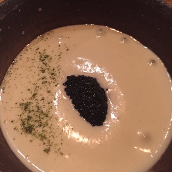 Emmer & Rye - A rice porridge custard with caviar... interesting... - Tapas/Small Plates Near Me - Austin, Texas