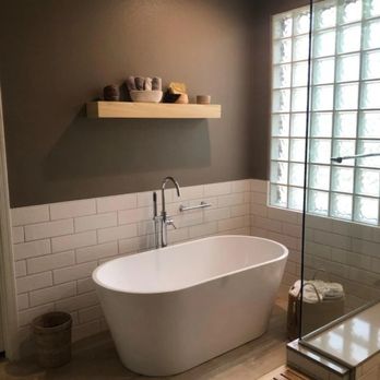 Henley's Floor & Home Pros - a bathtub in a bathroom - Flooring Near Me - Surprise, Arizona Henley's Floor & Home Pros - a bathtub in a bathroom - Flooring Near Me - Surprise, Arizona