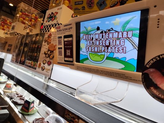 Kura Revolving Sushi Bar by null