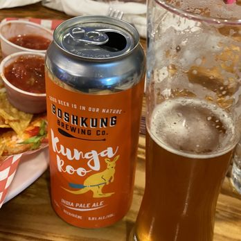 Algonquin Cookhouse - a glass of beer and a plate of nachos - American Near Me - Harcourt, Ontario