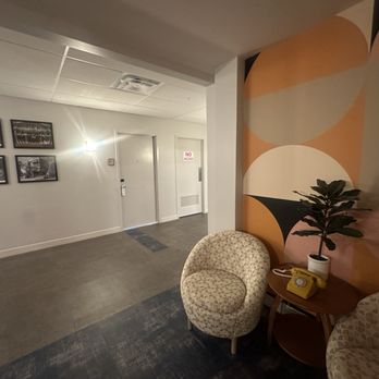 The Orbit Hotel - Sitting area and NASA photos on my floor after getting off the elevator - Hotels Near Me - Fairview Park, Ohio The Orbit Hotel - Sitting area and NASA photos on my floor after getting off the elevator - Hotels Near Me - Fairview Park, Ohio