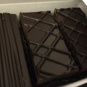 The Chocolate Caper - Dark chocolate almond toffee and dark chocolate peanut butter pralines. - Chocolatiers & Shops Near Me - Oregon, Wisconsin