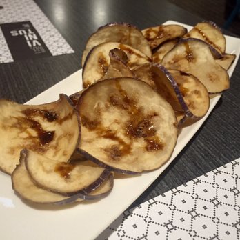 Vinitus - Eggplant chips with touch of honey - Tapas Bars Near Me - Barcelona, B Vinitus - Eggplant chips with touch of honey - Tapas Bars Near Me - Barcelona, B
