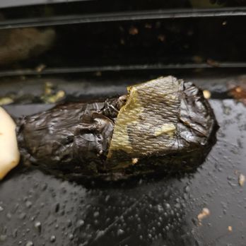 Tantalus Restaurant - some non-food item stuck to domaldes received in food delivery - Greek Near Me - Issaquah, Washington Tantalus Restaurant - some non-food item stuck to domaldes received in food delivery - Greek Near Me - Issaquah, Washington