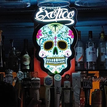 Lucianas Mexican Restaurant - a neon sign of a sugar skull - Mexican Near Me - Indianapolis, Indiana