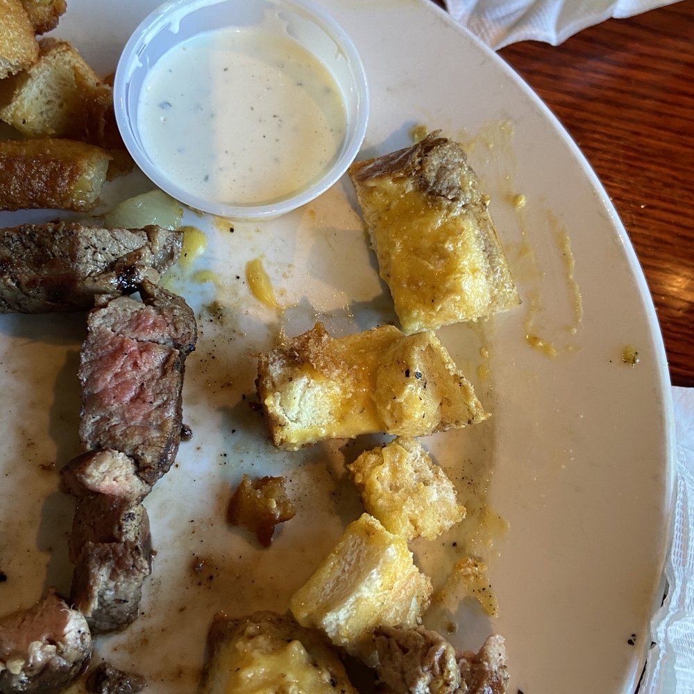 steak bites and garlic bread. steak bites and garlic bread.