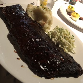 BrickTop's - Full rack of BBQ pork baby back ribs = HIGHLY recommend. 100% fall off the bone. - New American Near Me - Naples, Florida BrickTop's - Full rack of BBQ pork baby back ribs = HIGHLY recommend. 100% fall off the bone. - New American Near Me - Naples, Florida