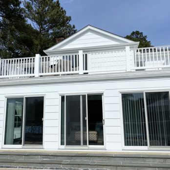 Solid Construction - a house with a pool and deck - General Contractors Near Me - Lewes, Delaware
