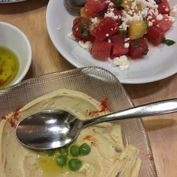 Zaytinya - bottom: HOMMUS purée of chickpeas, garlic, tahini - Greek Near Me - Washington, DC, District of Columbia Zaytinya - bottom: HOMMUS purée of chickpeas, garlic, tahini - Greek Near Me - Washington, DC, District of Columbia