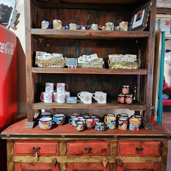 Old Town Cafe - a wooden hutch with many items on it - New Mexican Cuisine Near Me - Albuquerque, New Mexico