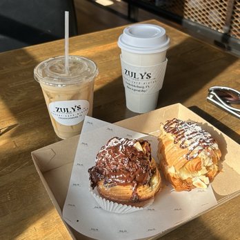 Zulys Bakery - Chocolate-Almond croissant was awesome (right), chocolate cruffin meh, coffees were good - Bakeries Near Me - Fredericksburg, Texas