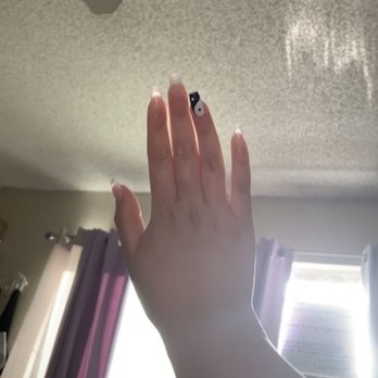 The Nail Loft - Yin and Yang inspired nails, white french-tip nails with the Yin and Yang sign on the ring finger. - Nail Salons Near Me - Montclair, California