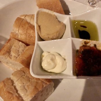 Tarbell's - Bread with four dipping choices, hummas, tomato and basil, oil and vinegar, and butter! - New American Near Me - Phoenix, Arizona Tarbell's - Bread with four dipping choices, hummas, tomato and basil, oil and vinegar, and butter! - New American Near Me - Phoenix, Arizona