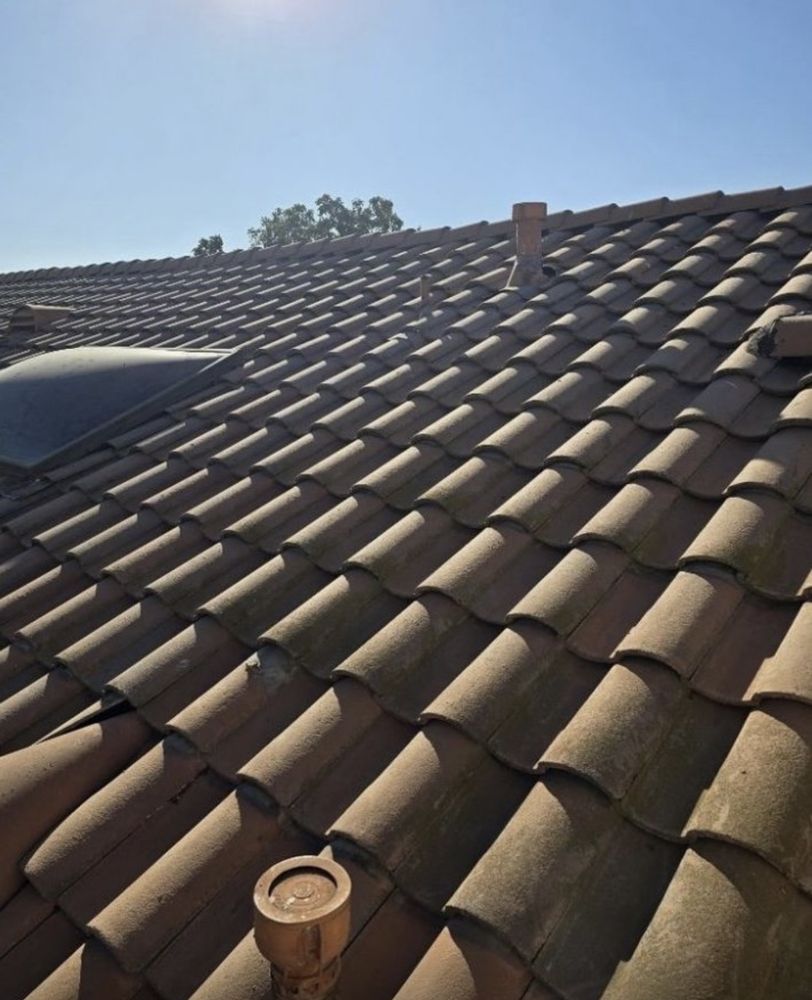 Slide of Richy’s Roofing Repair