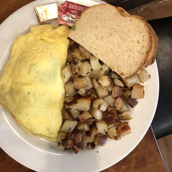 Crepevine - Greek omelette with country potatoes and sourdough toast. The feta cheese was delicious! - New American Near Me - San Rafael, California Crepevine - Greek omelette with country potatoes and sourdough toast. The feta cheese was delicious! - New American Near Me - San Rafael, California
