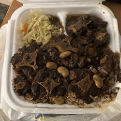 Reggae Kitchen - Oxtail with rice and peans. With extra cabbage.
