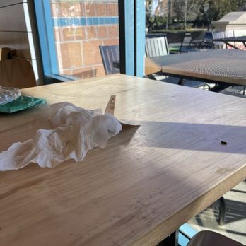 CAVA - Filthy table. Even our wipes were black from wiping part of the table surface. - Mediterranean Near Me - Rancho Cucamonga, California CAVA - Filthy table. Even our wipes were black from wiping part of the table surface. - Mediterranean Near Me - Rancho Cucamonga, California
