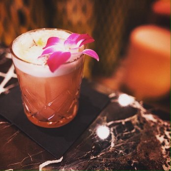 Le Royal - a drink with a flower in it - Cocktail Bars Near Me - Montreal, Quebec