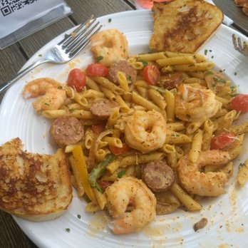 Foster's Kitchen Waikoloa - Cajun Shrimp Penne Pasta showing all six shrimp with tails removed - American Near Me - Waikoloa, Hawaii Foster's Kitchen Waikoloa - Cajun Shrimp Penne Pasta showing all six shrimp with tails removed - American Near Me - Waikoloa, Hawaii