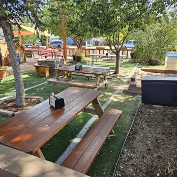 GB Fish  & Chips - View of patio with sandbox for kids and firepit - Fish & Chips Near Me - Arvada, Colorado